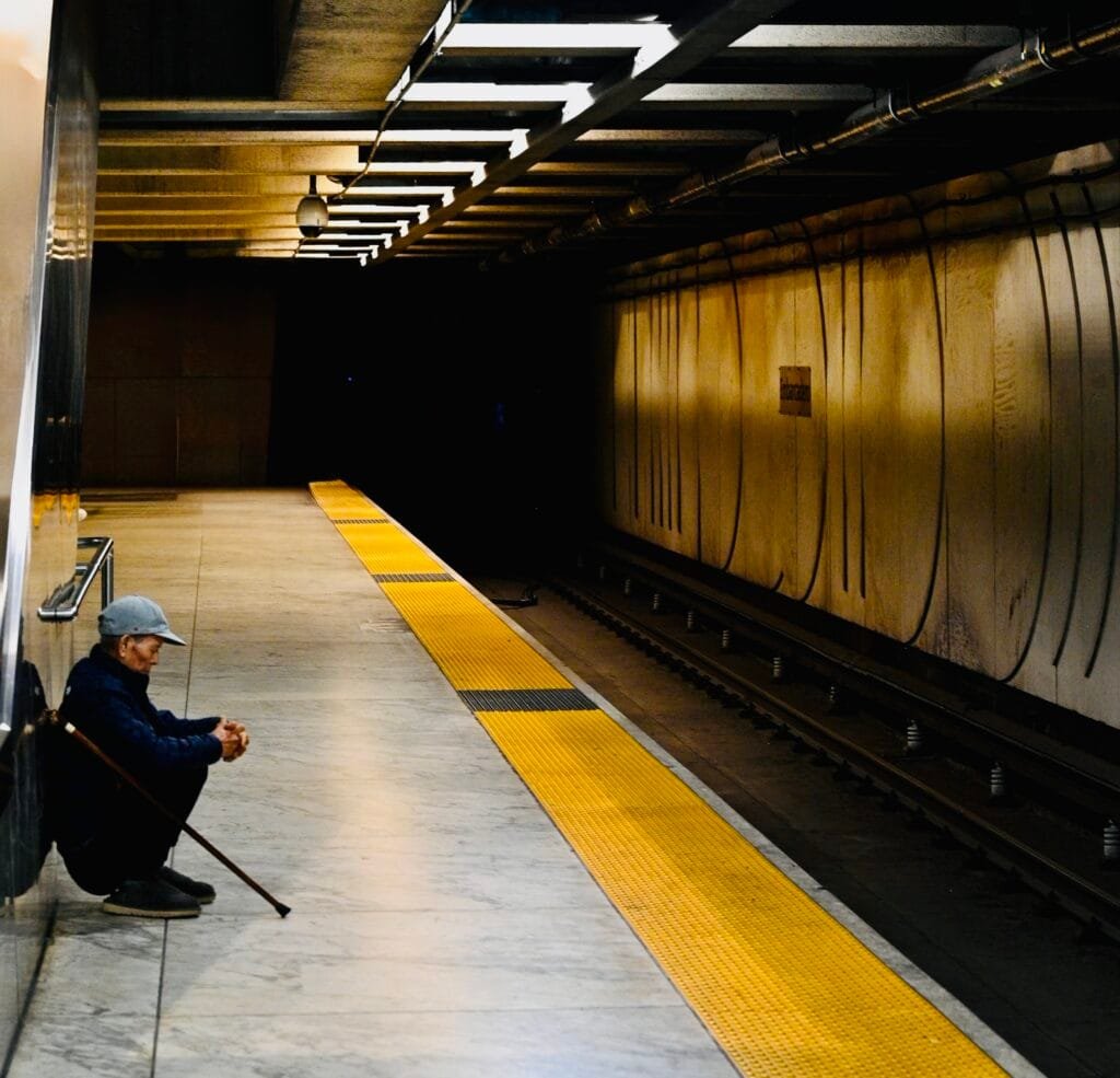 Old man meditating Montgomery BART